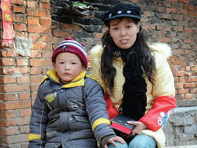 This is the first Bible for Zhang, 28, and her son Wang, 4