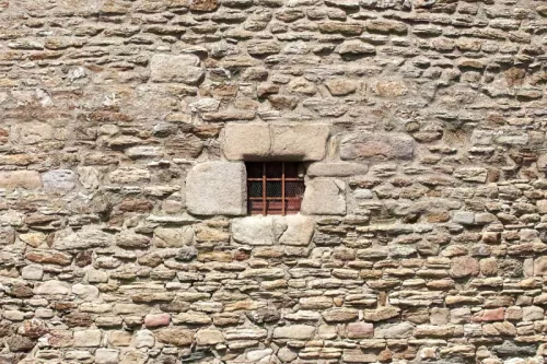 Building with grated window