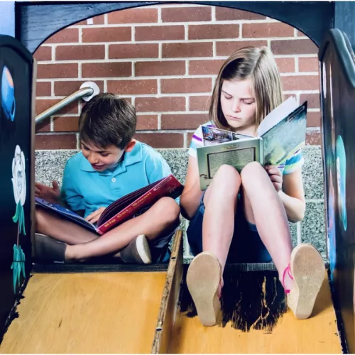 Two children reading