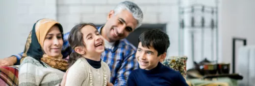 Refugee family laughing