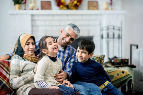 Refugee family laughing