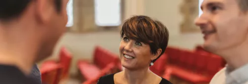 Dawn smiling upwards