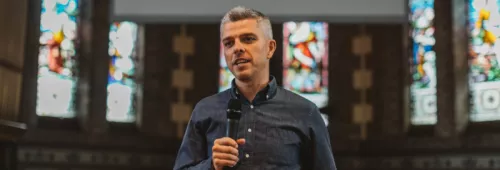 Peter holding microphone