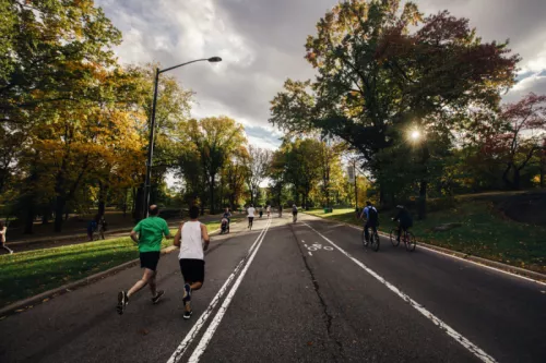 Group running in local park