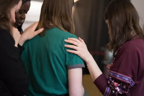 Group of women praying