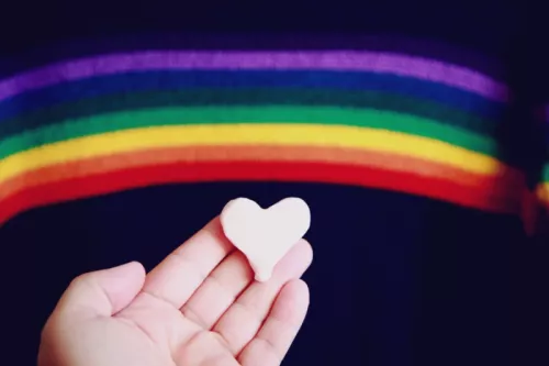 Rainbow heart hand