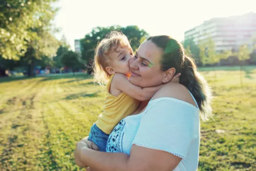 Mother and child embrace