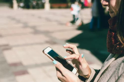 Woman scrolling on phone