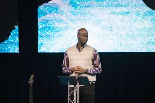 Pastor Kwame preaching