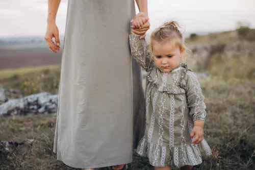 Woman walking with child