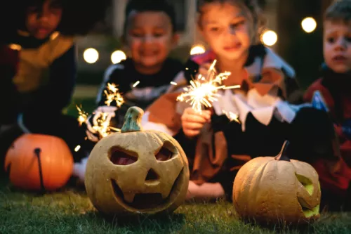 Pumpkin kids and sparklers