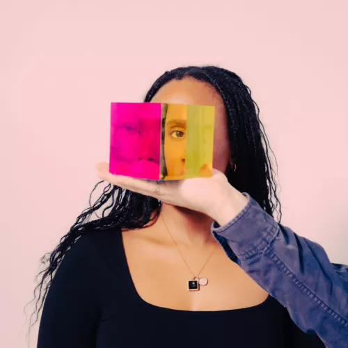 Woman with prism by nick fancher on unsplash square