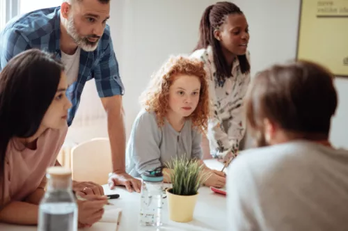 Group of staff in boardroom